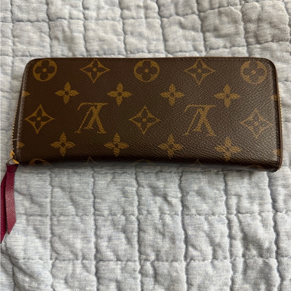 Authentic Louis Vuitton Monogram Canvas Zip Wallet in Brown and Gold.
